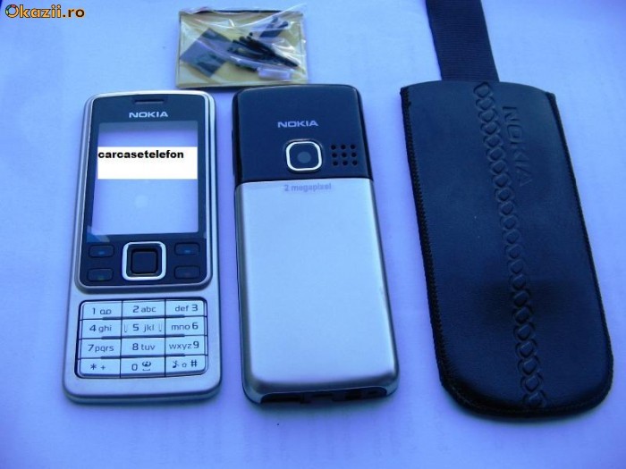 CARCASA NOKIA 6300 SILVER COMPLETA,METALICA +HUSA SI SURUBURI CADOU,POZE REALE foto mare
