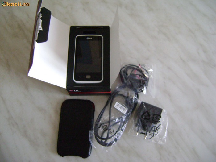 Lg E 510 - Nou - In garantie-  + Bonus Husa Mario Seppona Neagra foto mare